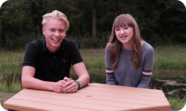 The photo of two young people man and woman the smilling