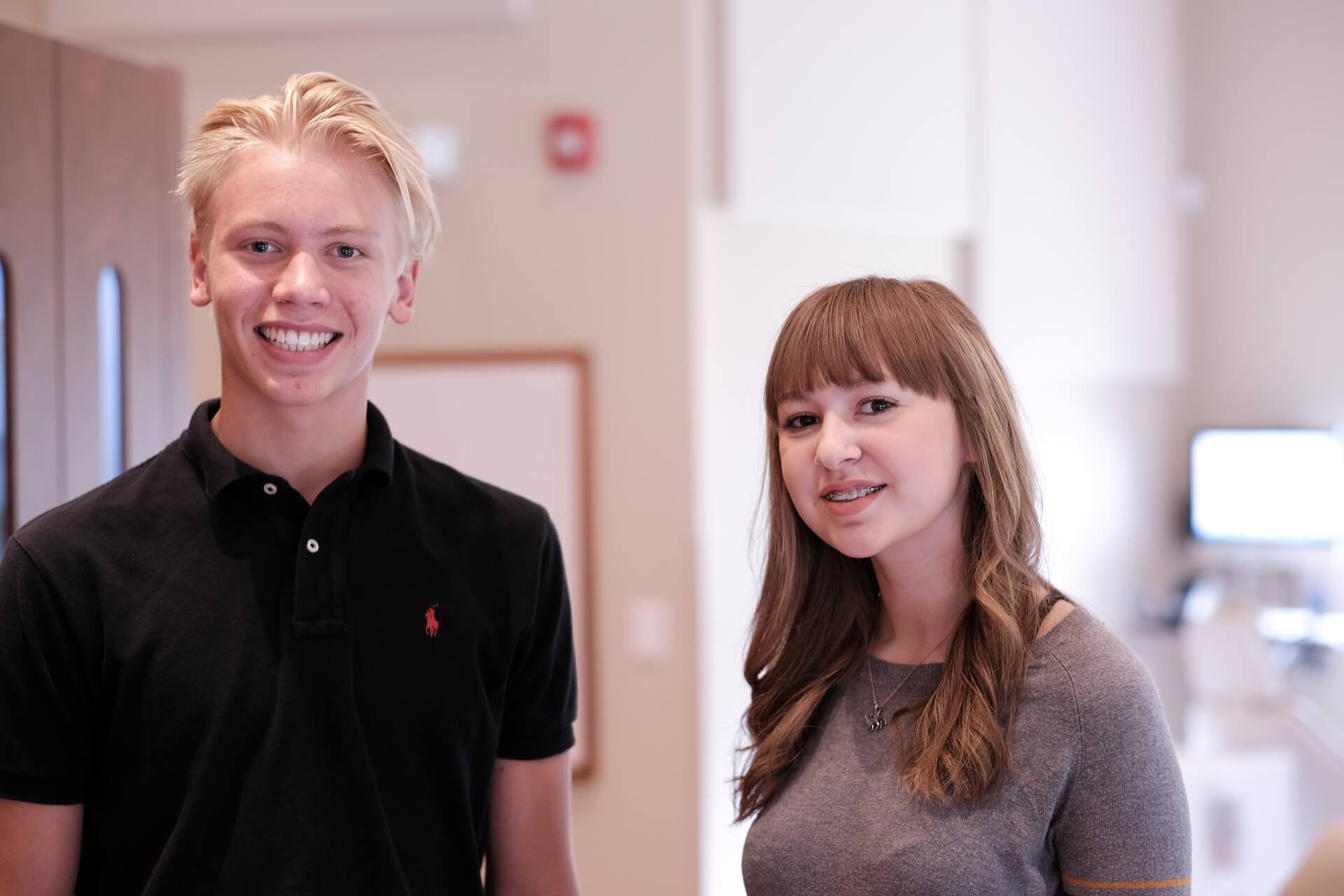 A photo of a smiling teenagers